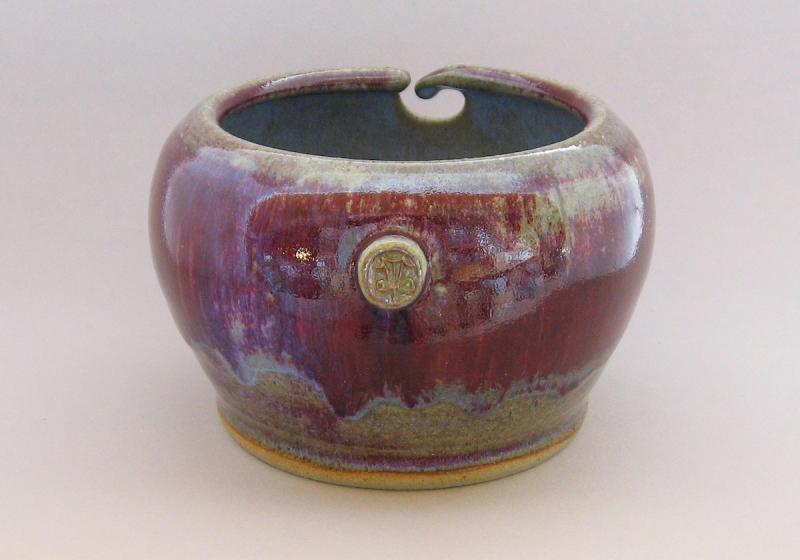 handmade yarn bowl in purple chun stoneware glaze