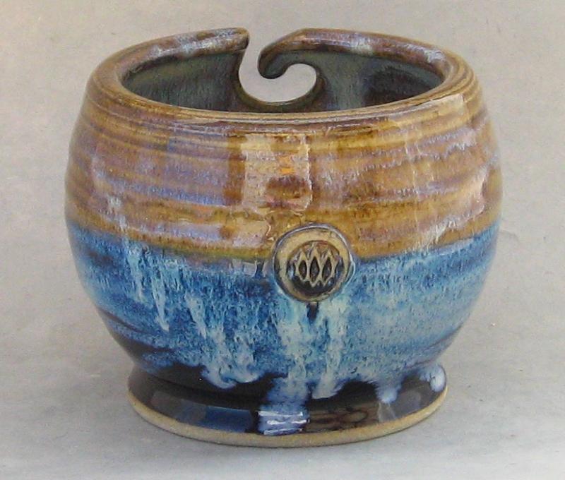 handmade yarn bowl in northern lights with cobalt blue stoneware glaze